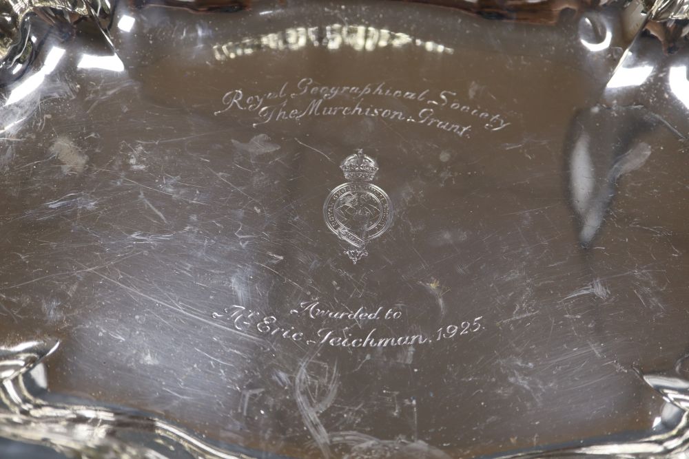 A George V parcel gilt silver shaped oval presentation bowl, Harman & Co, London, 1924, 40.3cm, 27oz.